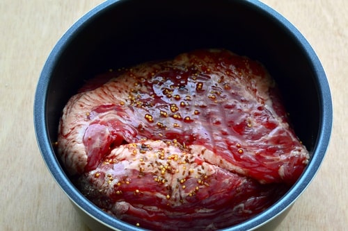 Place the corned beef on top of a trivet inside the pressure cooker