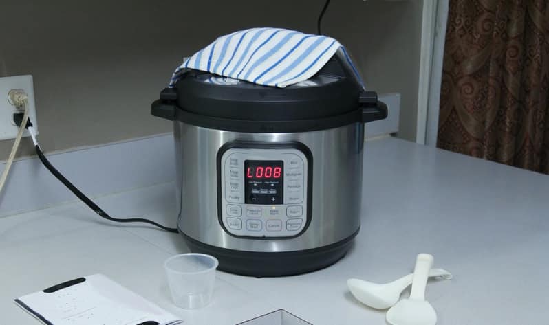 DO NOT cover your Instant Pot while it's cooking