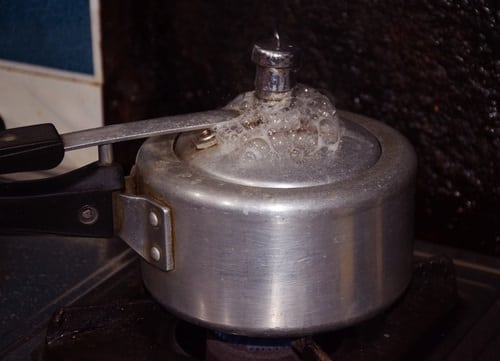 Water coming out of a pressure cooker