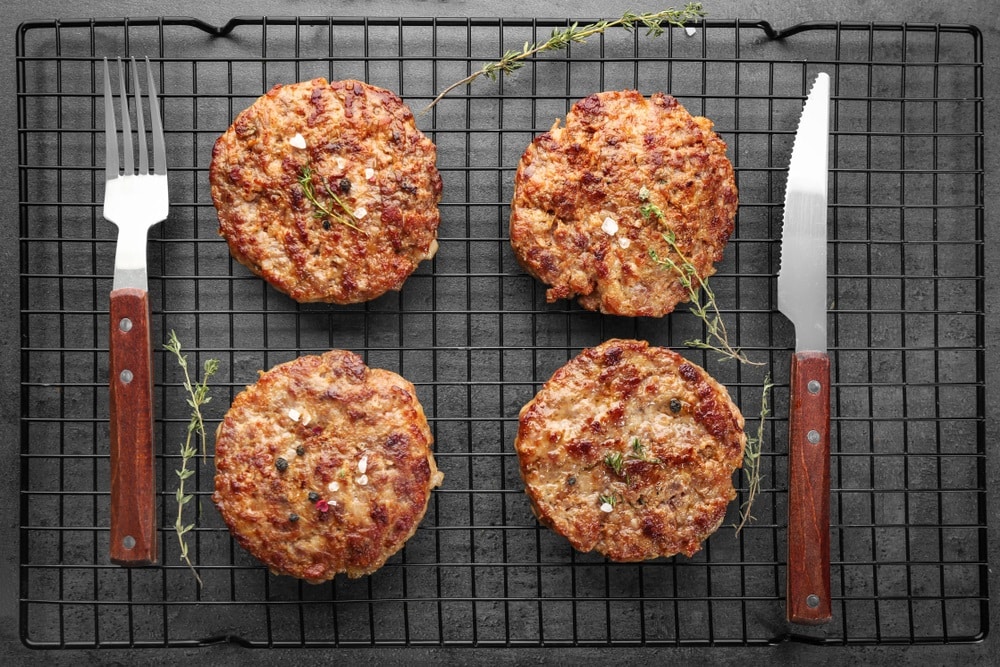 burger patties on cooling rack