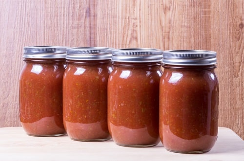 Freshly made acidic tomato sauce canned in mason jars