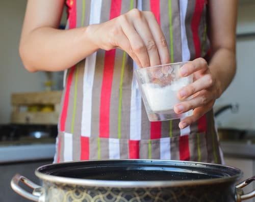 Add salt or vinegar by the end of the cooking process