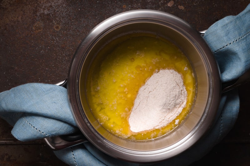 broth flour veloute sauce wooden table top view