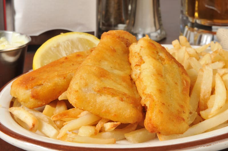 battered fish sticks closeup French fries