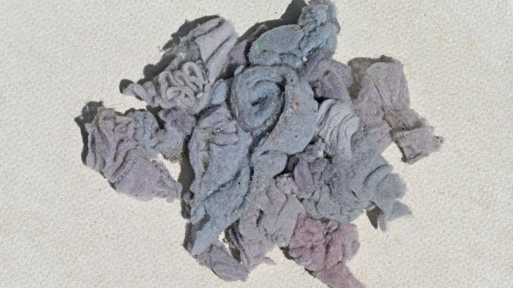 A pile of lint from a cloths dryer