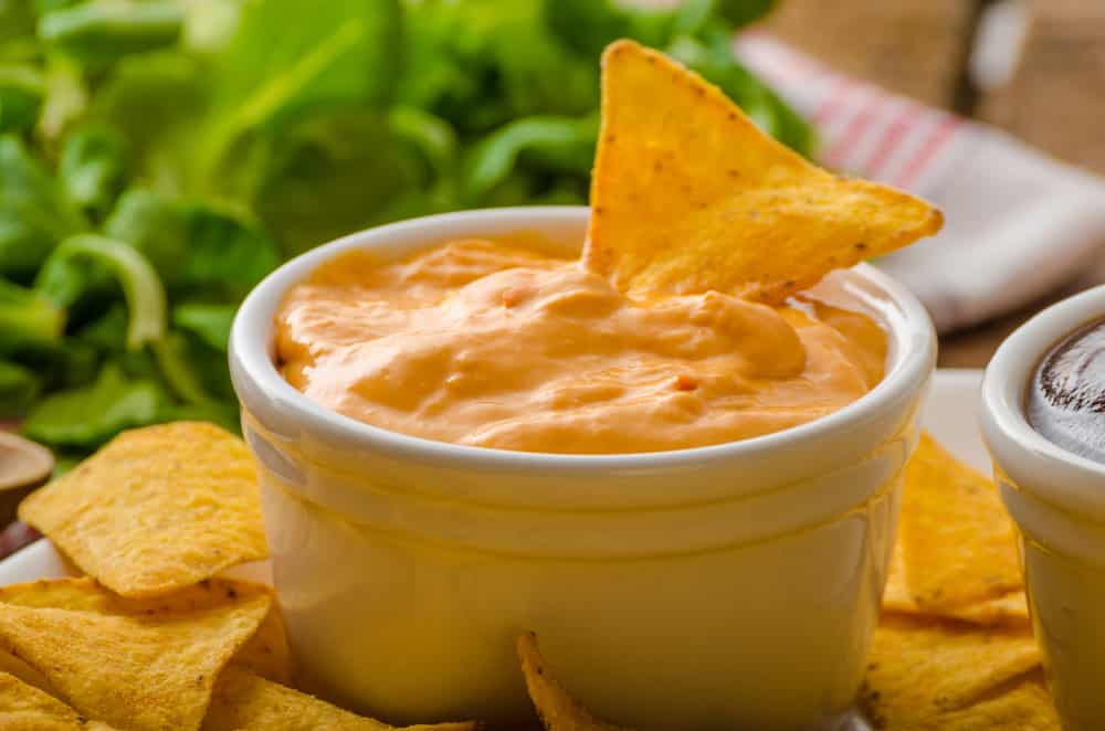 Tortilla chips with cheese dip