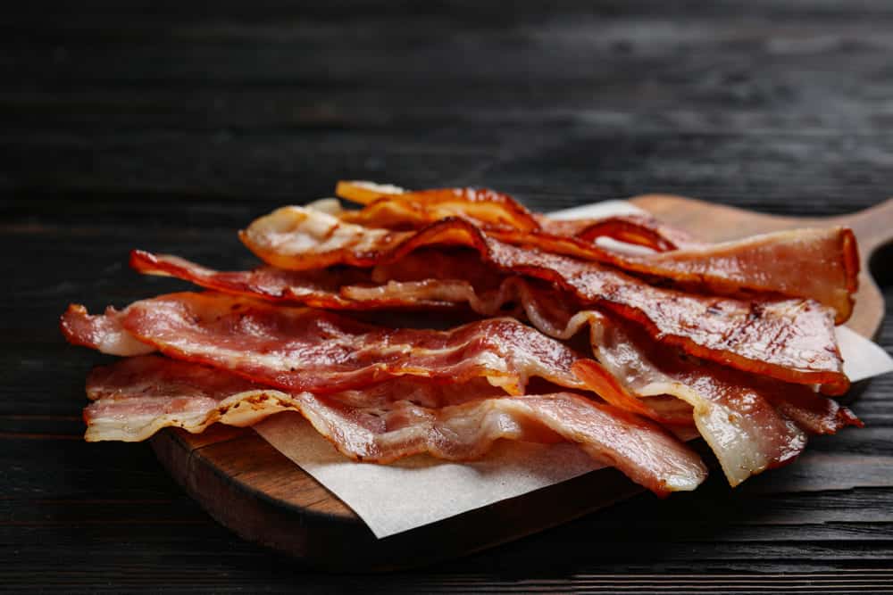 how to keep bacon from curling when frying