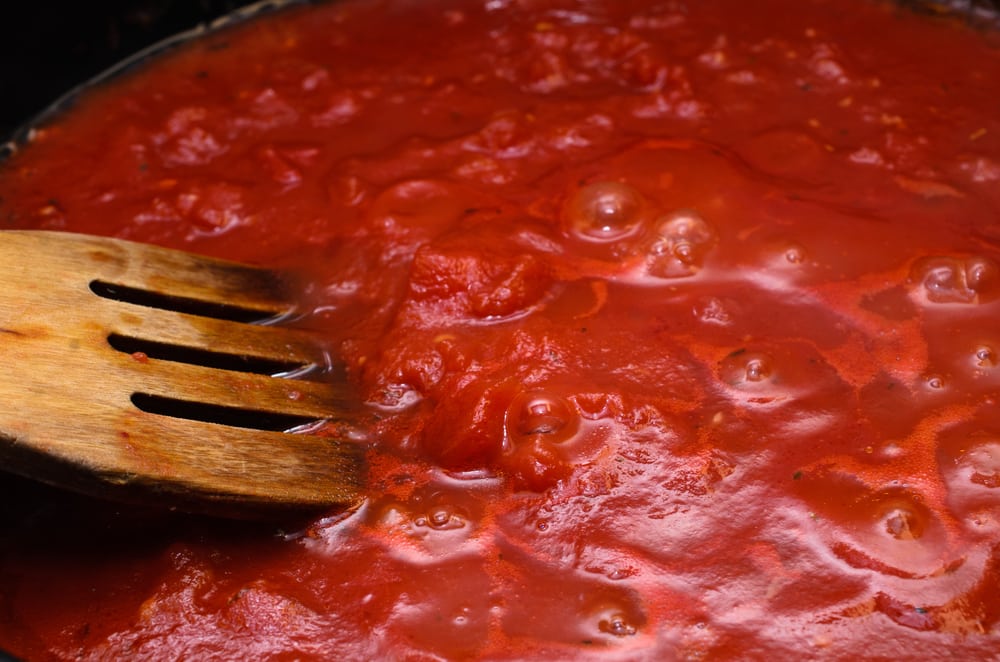 simmer spaghetti sauce covered or uncovered