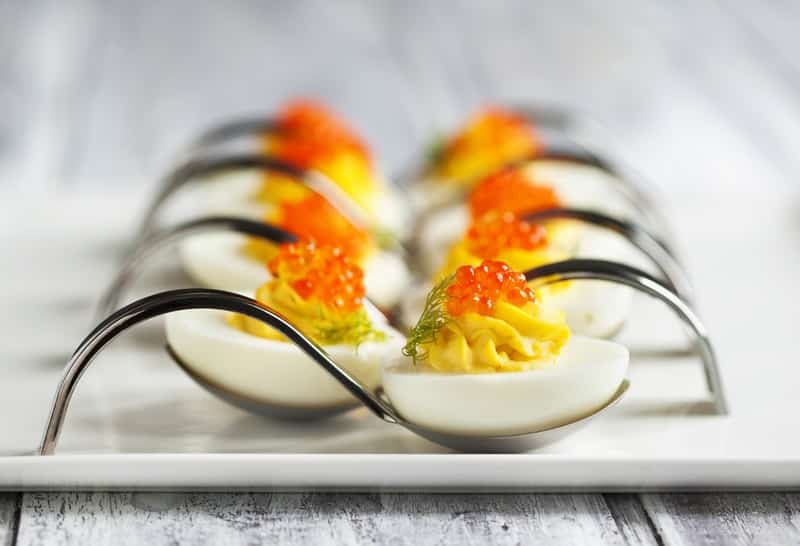 Deviled eggs with red caviar