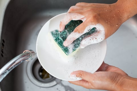 Hand washing dishes