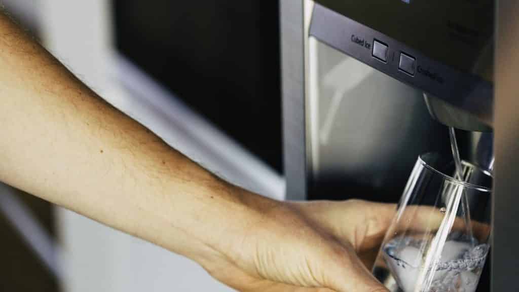 Getting water in the refrigerator water dispenser