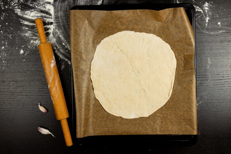 Pizza Dough Sticks to Parchment Paper