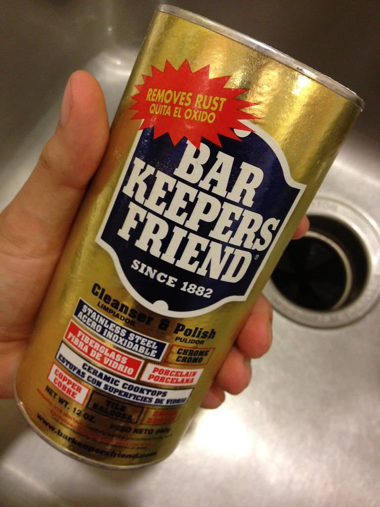 A hand holding bar keepers friend