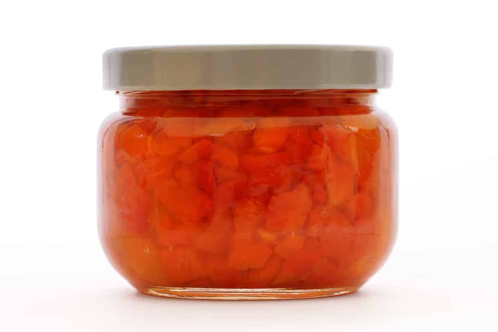 Bright red jar of canned pimentos