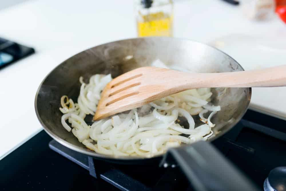 Frying onion into the pan