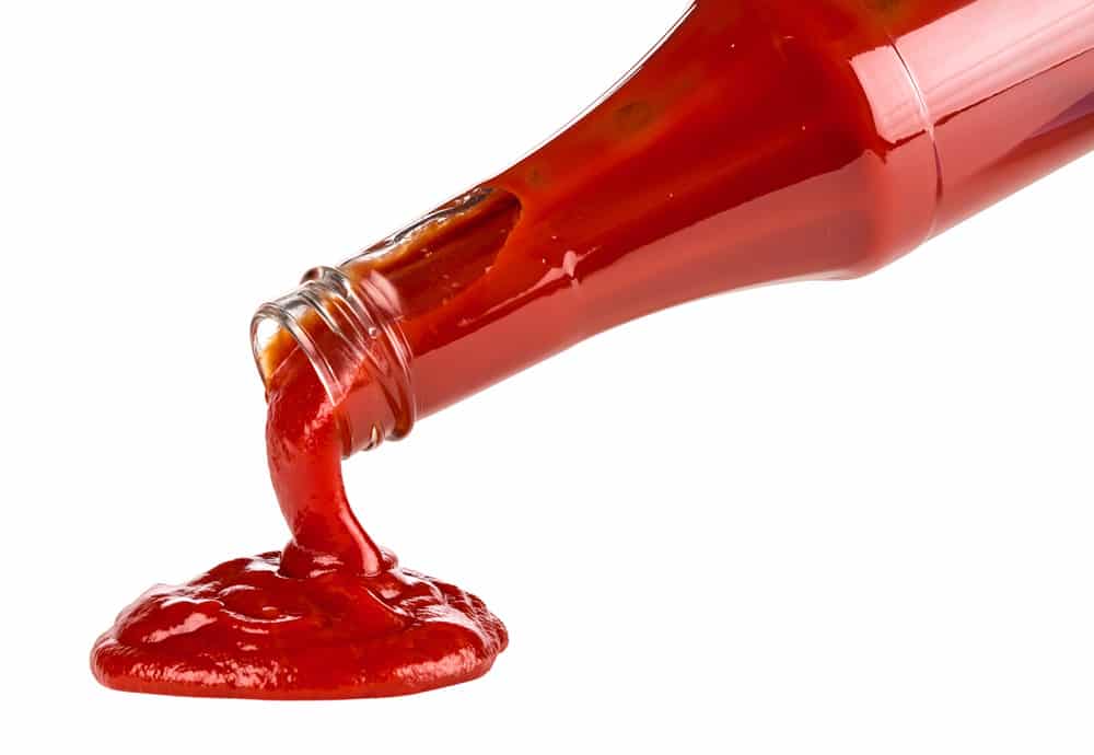 ketchup pouring out of bottle