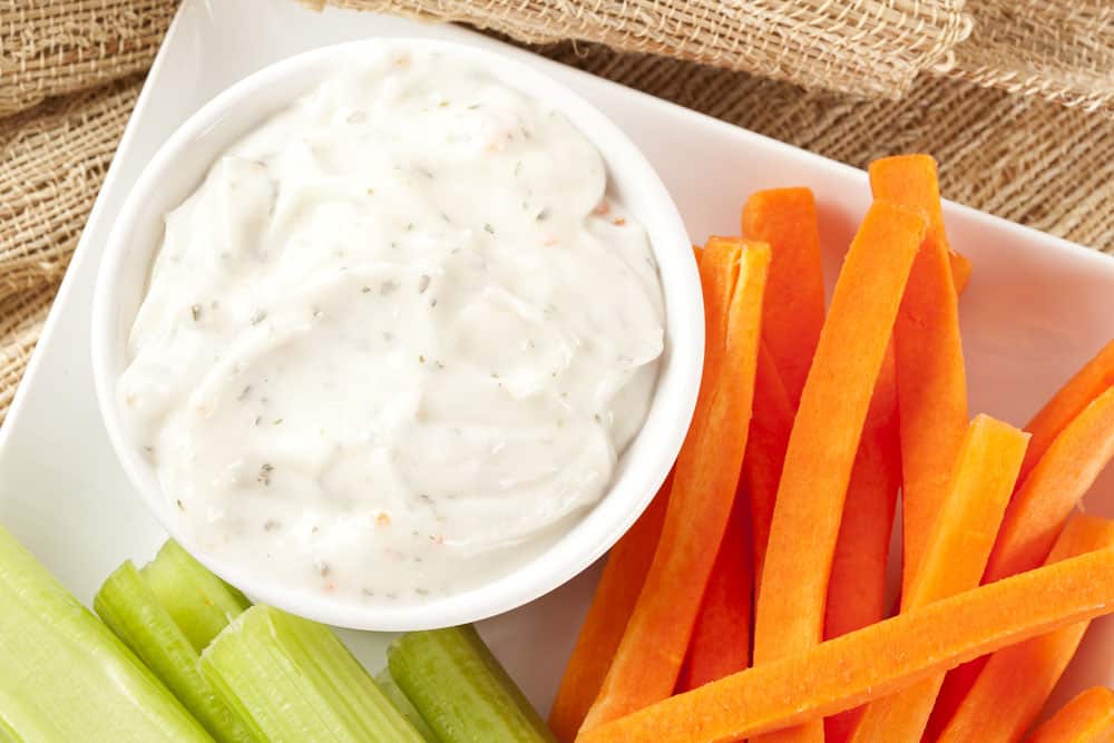 Ranch dressing with fresh carrots and celery