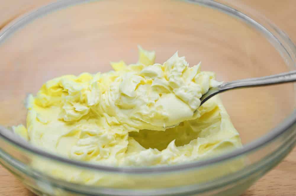 softened butter in a glass dish