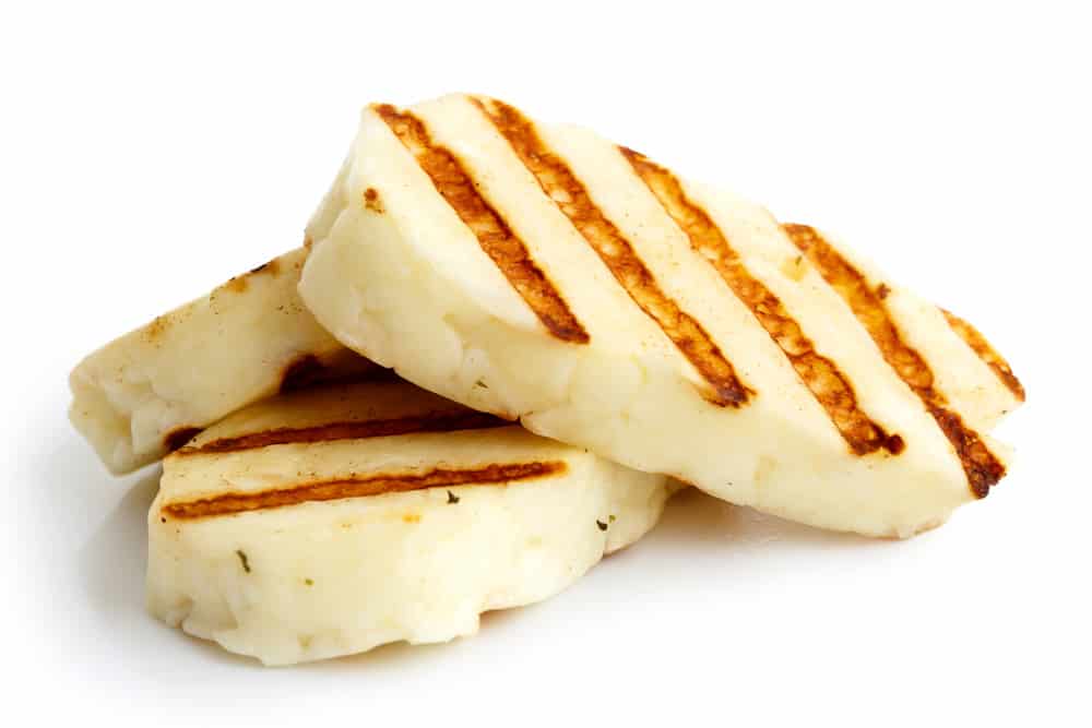 Three grilled slices of halloumi cheese 