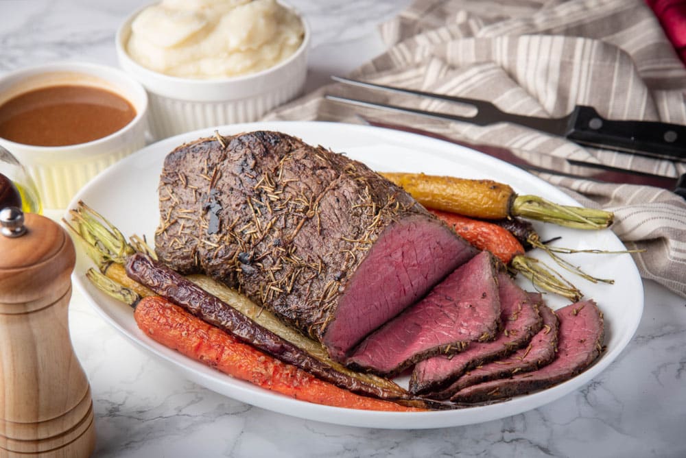 top round roast beef with carrot and mushed potato