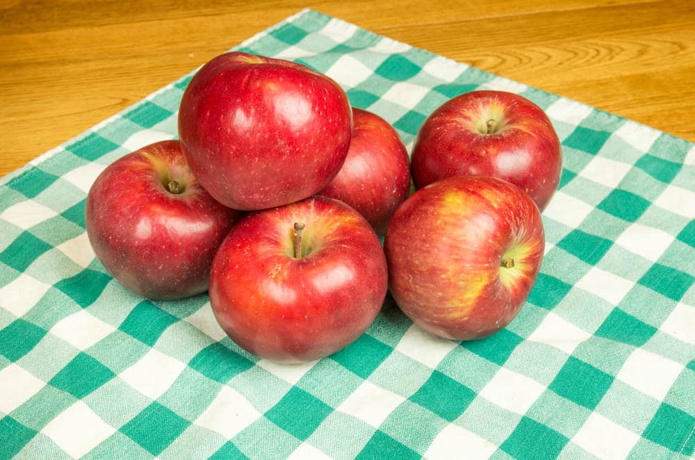 Winesap apples on a checked cloth