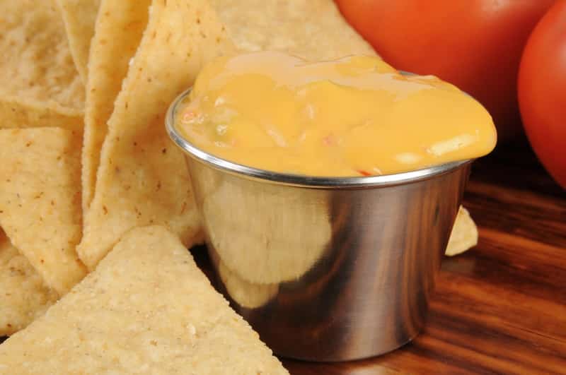 Corn chips and nacho cheese sauce