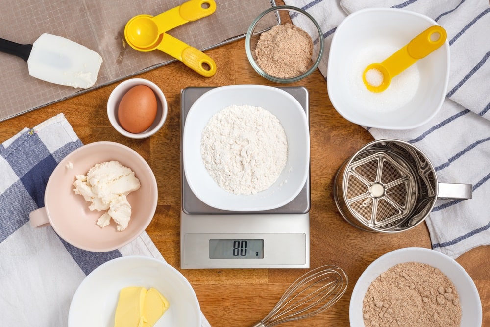 Flour on digital scale with cookie ingredients