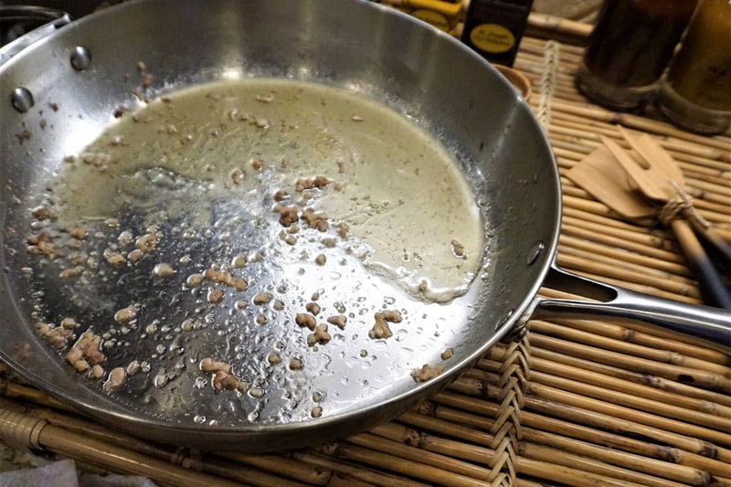 beef meat liquid grease sit cooling metal frying pan