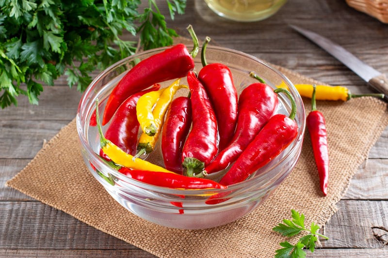 chili pepper preparation freezing wooden board