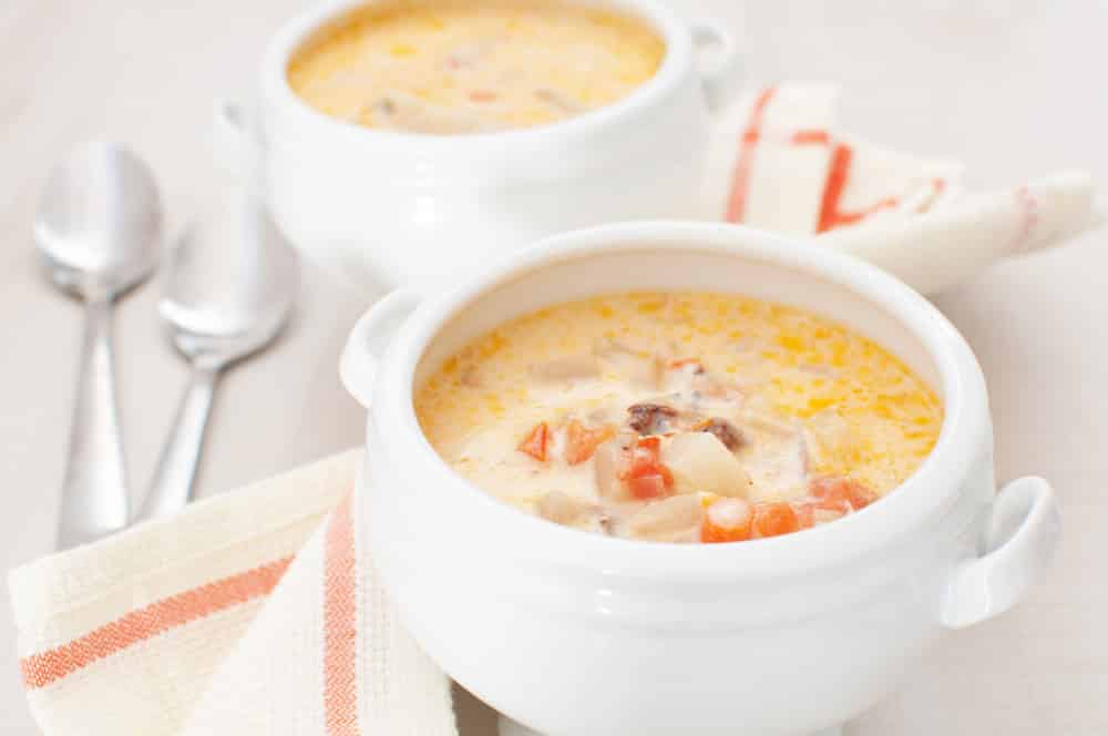 Chowder soup with vegetables, curry and heavy cream
