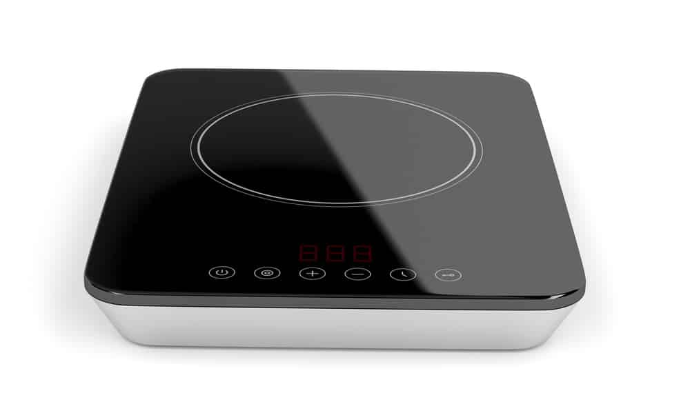 Portable induction cooktop on white background