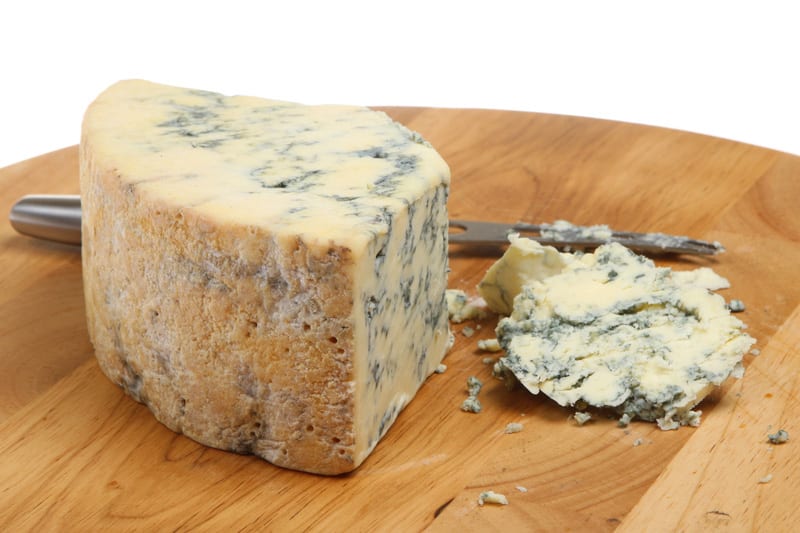 stilton cheese with cheese knife