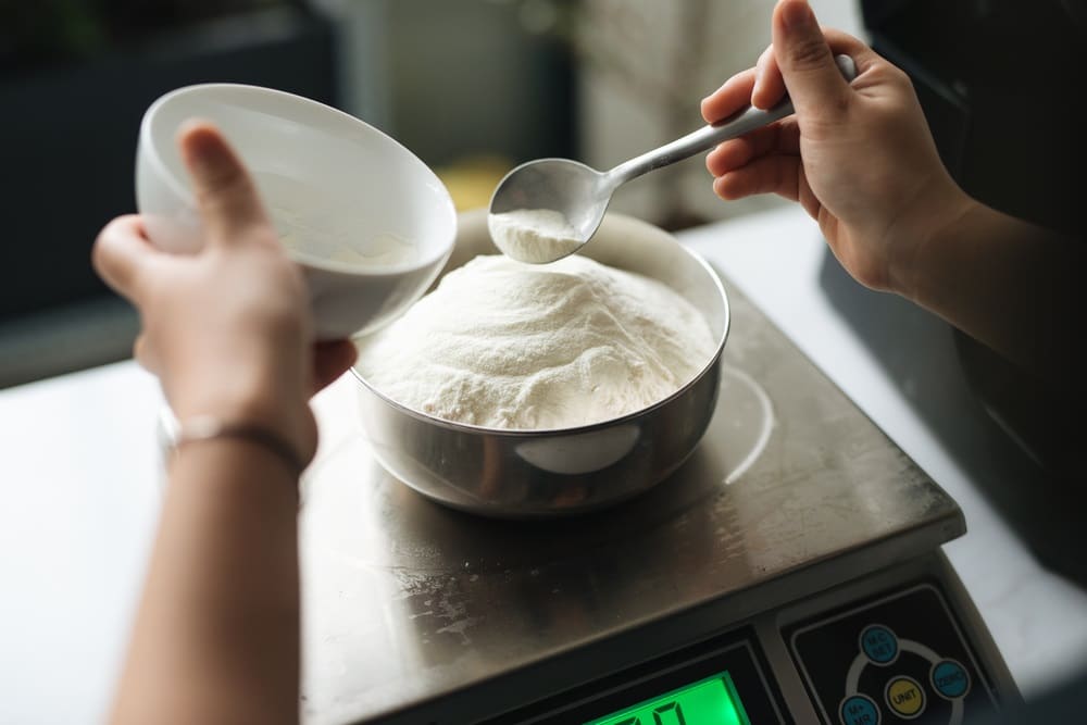 weighing flour on the digital scale