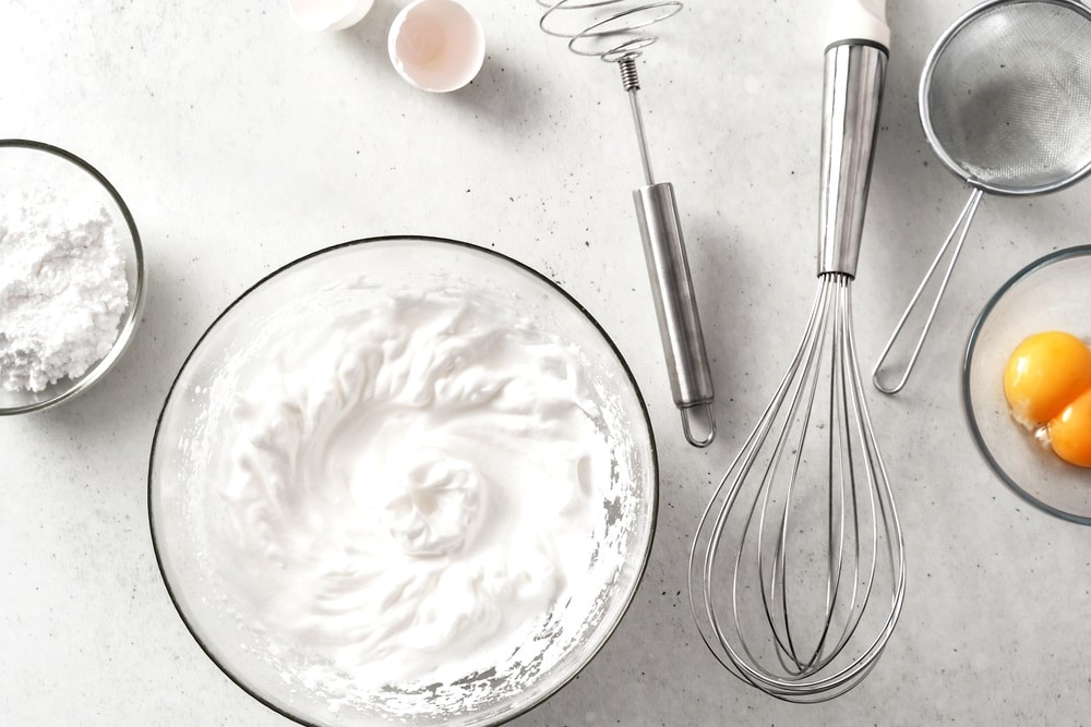 whipped eggs, ingredients and kitchen appliances