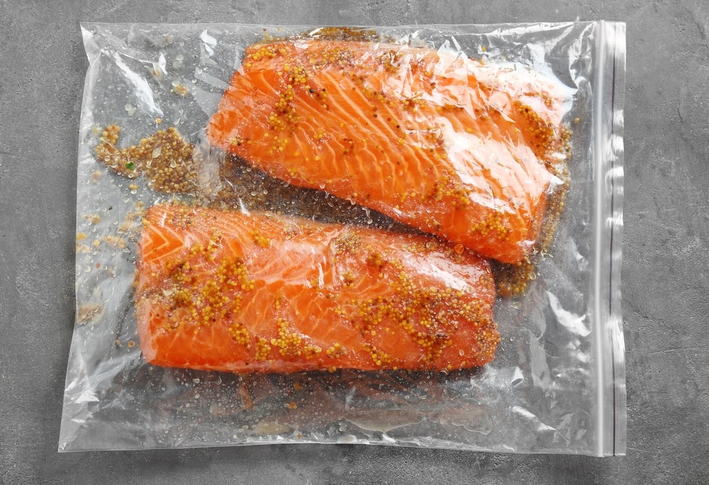 Zip lock bag with salmon filet marinade