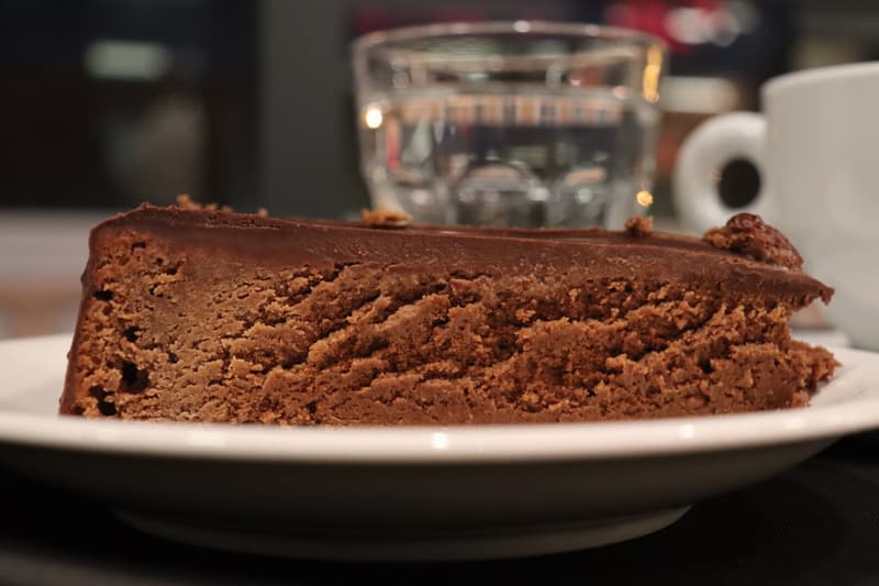 Chocolate cake with cafe and water