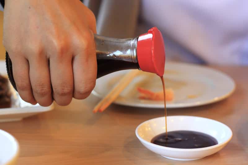 Pouring soy sauce