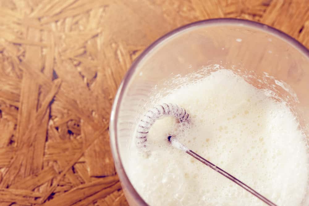 making foamy milk with milk frother