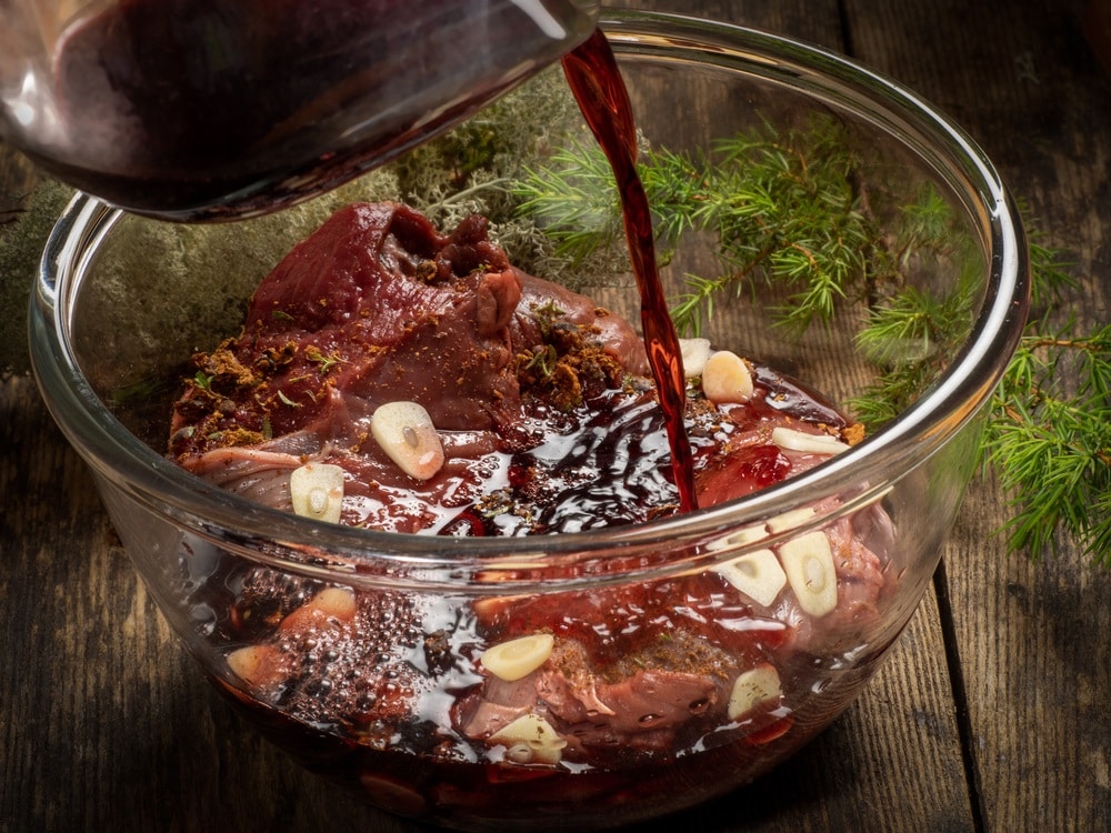 meat marinated in red wine sauce with wild herbs and garlic