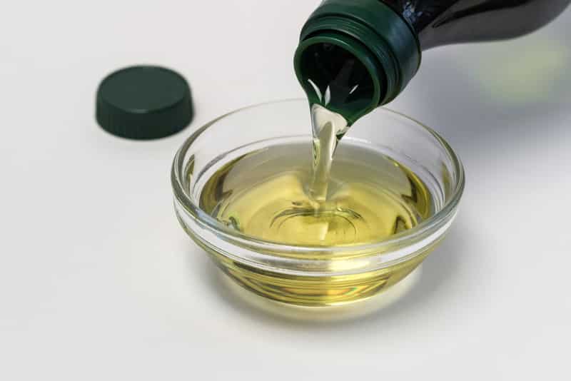 Pouring Grapeseed Oil in an Ingredient Bowl