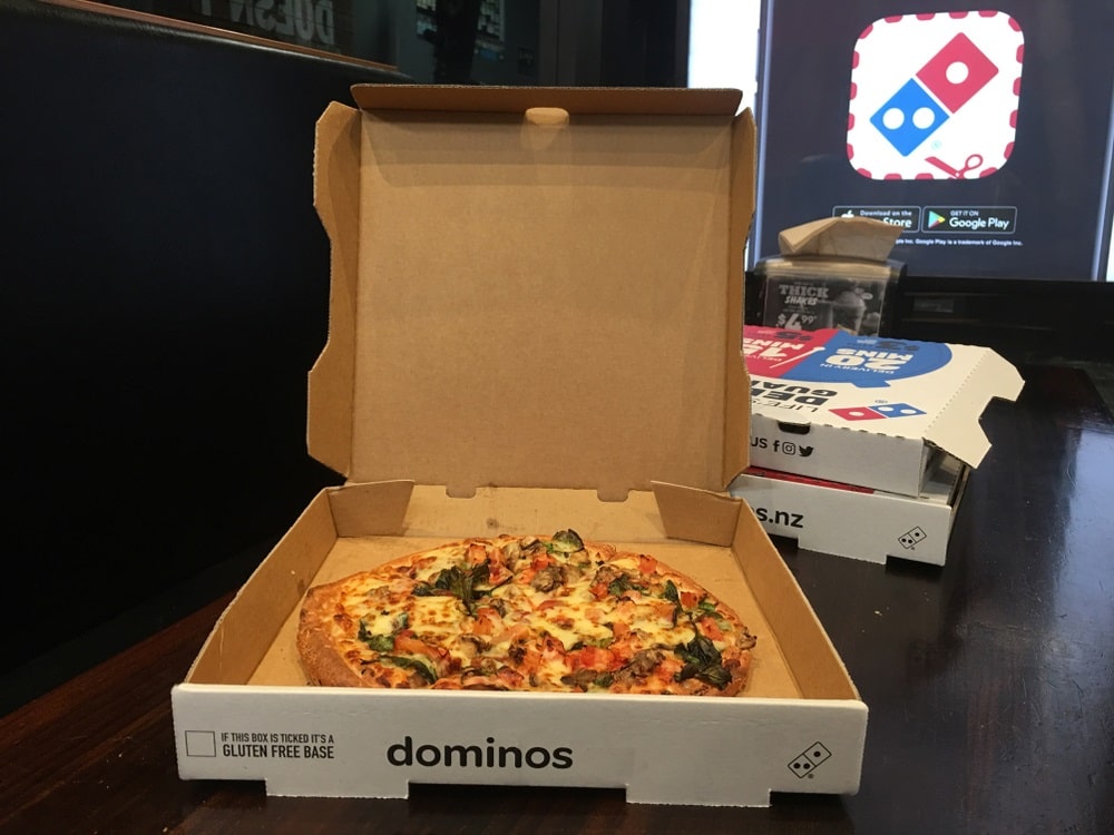 Domino's Pizza takaway box on a table