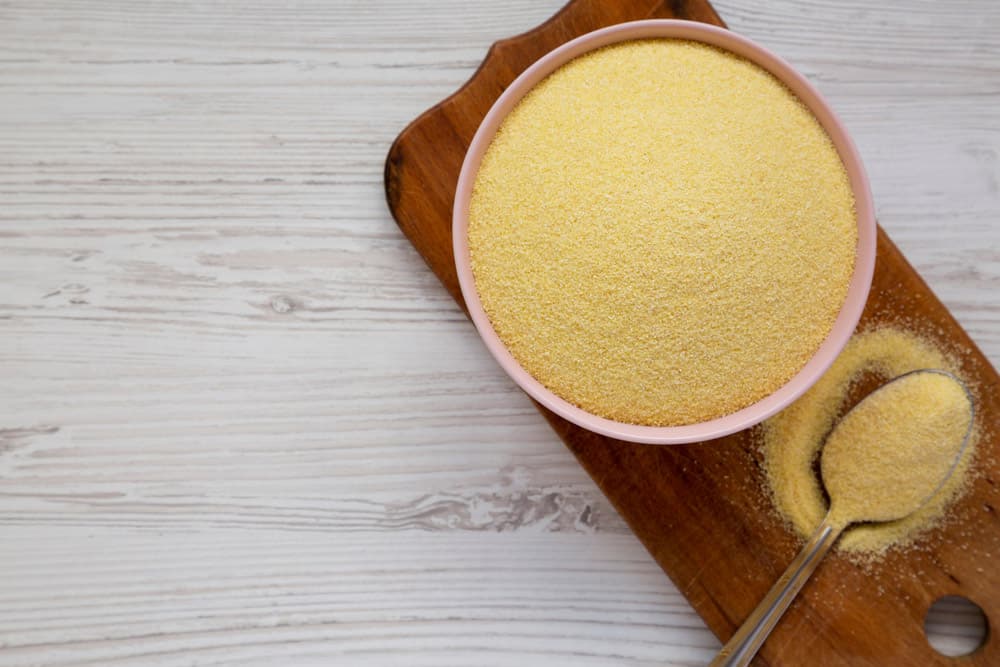 Dry semolina durum flour in a pink bowl