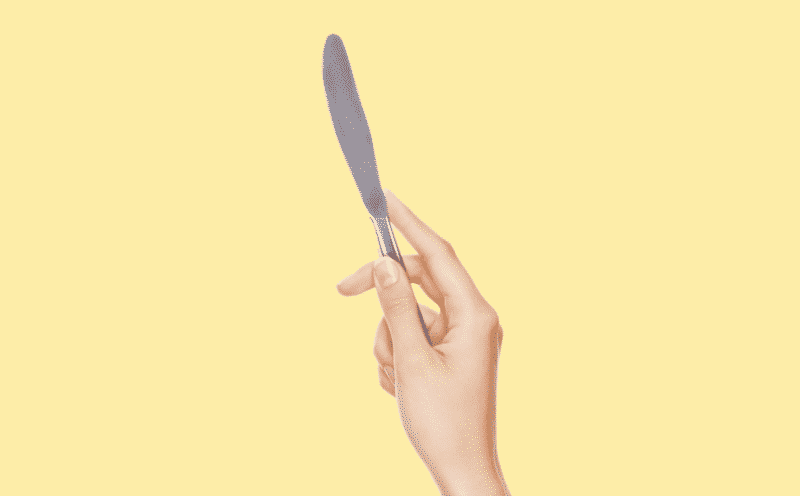 holding butter knife