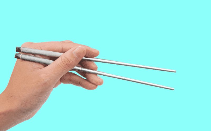 holding metal chopsticks