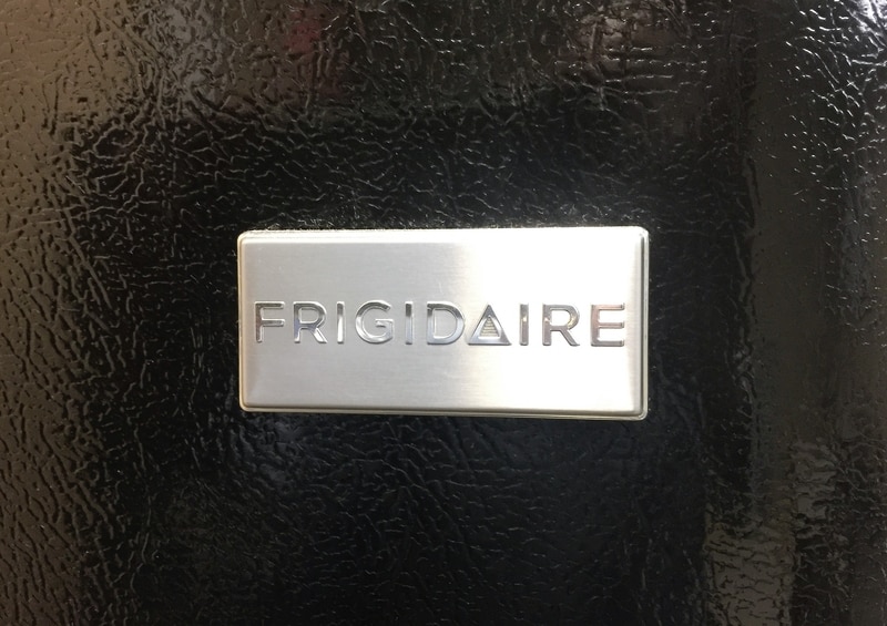 how to unlock frigidaire freezer without key