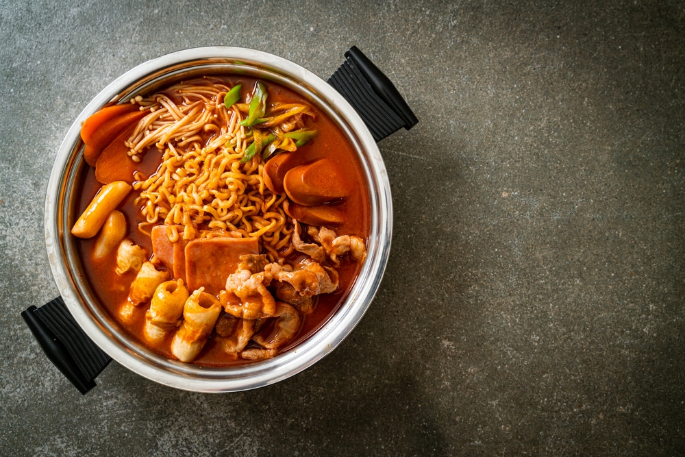 Instant pot filled with soup, noodle, meat