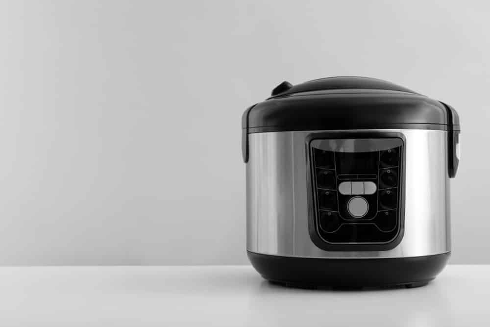 Modern electric multi cooker on table 