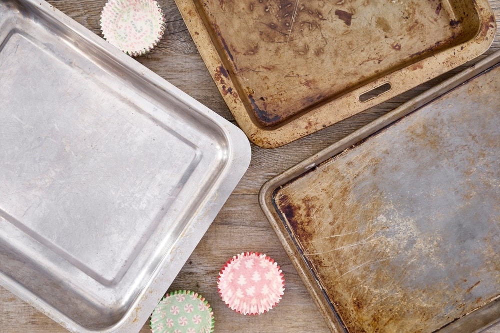 old dirty dented overused baking trays