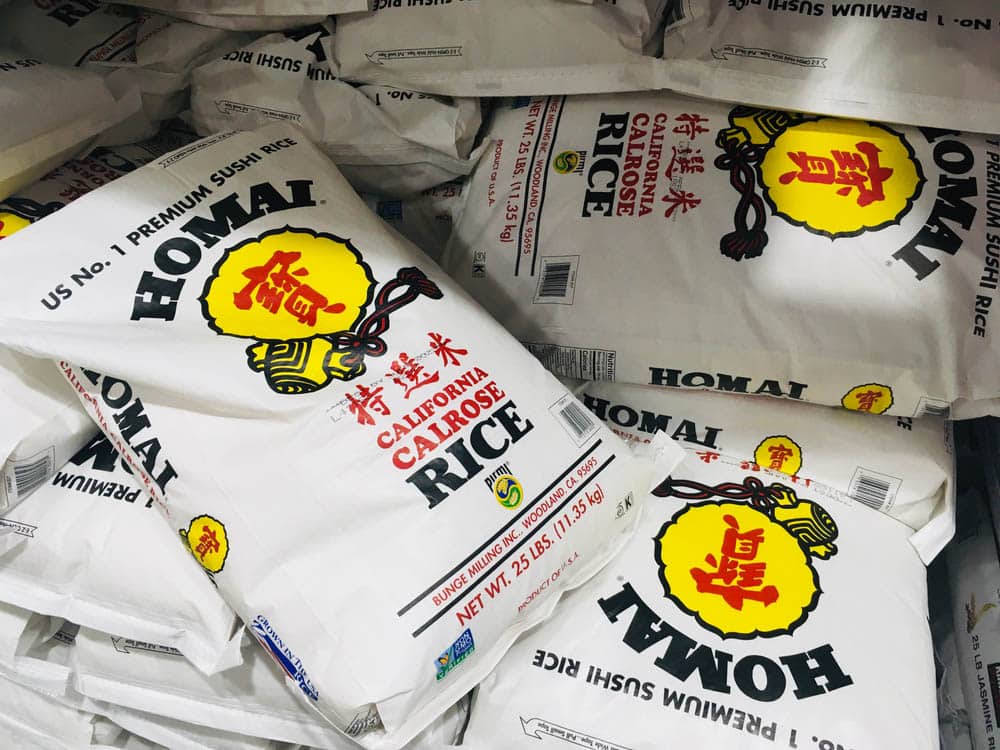 Bags of HOMAI California Calrose Rice at Costco wholesale store