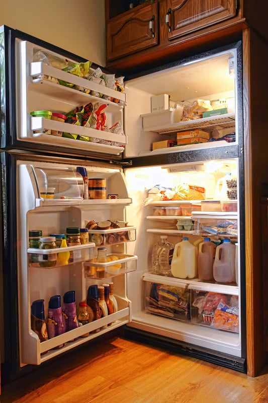 Cold Refrigerator Full of Fresh Food and Groceries